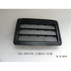 Rear bumper air outlet