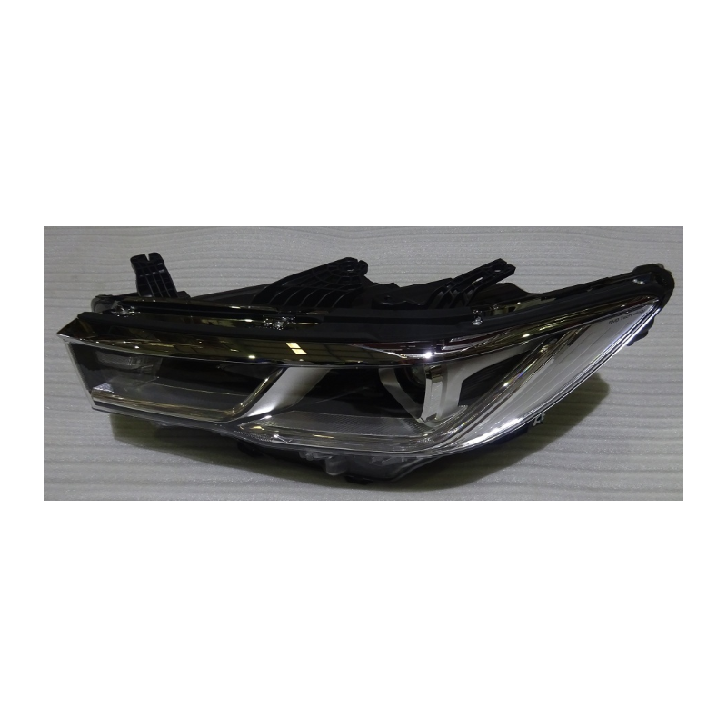 Low profile left front headlight